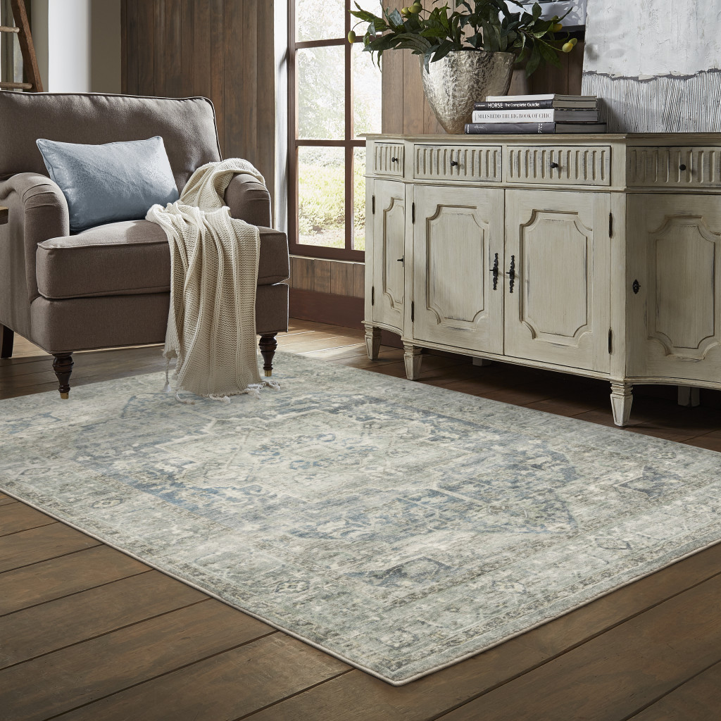 8" X 10" Grey Blue And Ivory Oriental Power Loom Stain Resistant Area Rug