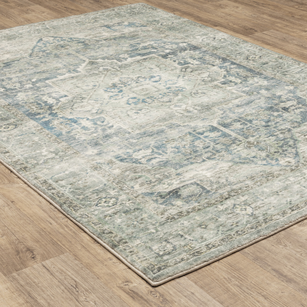 8" X 10" Grey Blue And Ivory Oriental Power Loom Stain Resistant Area Rug