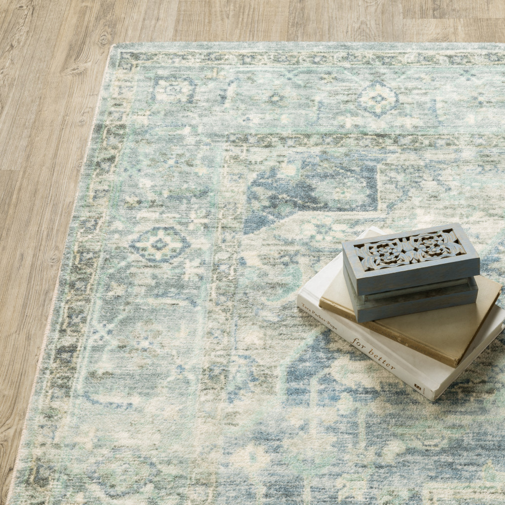 8" X 10" Grey Blue And Ivory Oriental Power Loom Stain Resistant Area Rug
