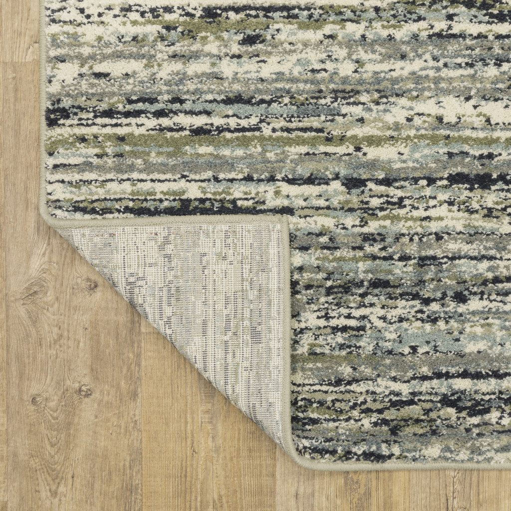 10" X 13" Blue Green Light Blue Grey And Ivory Abstract Power Loom Stain Resistant Area Rug