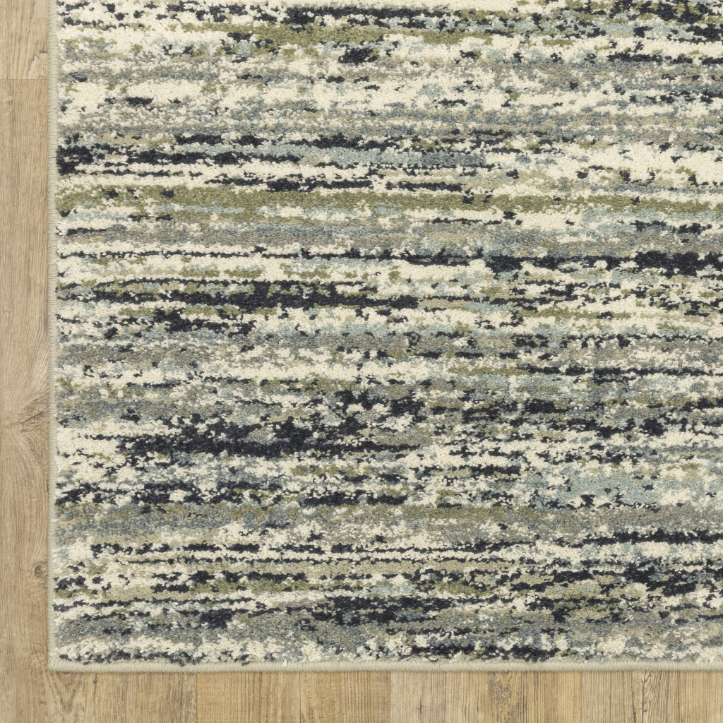 10" X 13" Blue Green Light Blue Grey And Ivory Abstract Power Loom Stain Resistant Area Rug