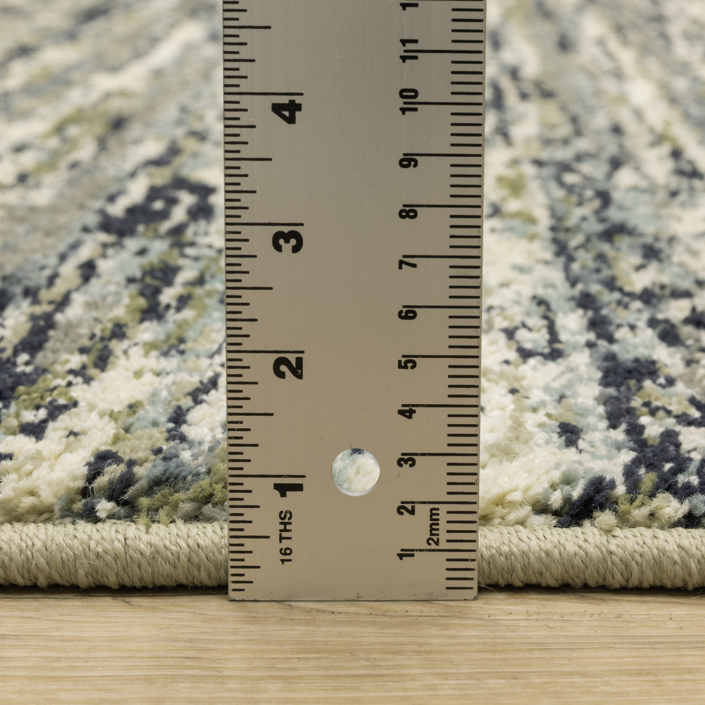10" X 13" Blue Green Light Blue Grey And Ivory Abstract Power Loom Stain Resistant Area Rug