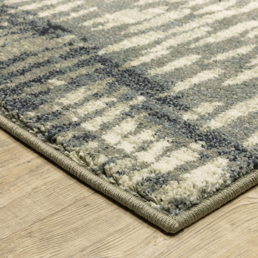 10" X 13" Grey Beige Blue And Light Blue Abstract Power Loom Stain Resistant Area Rug