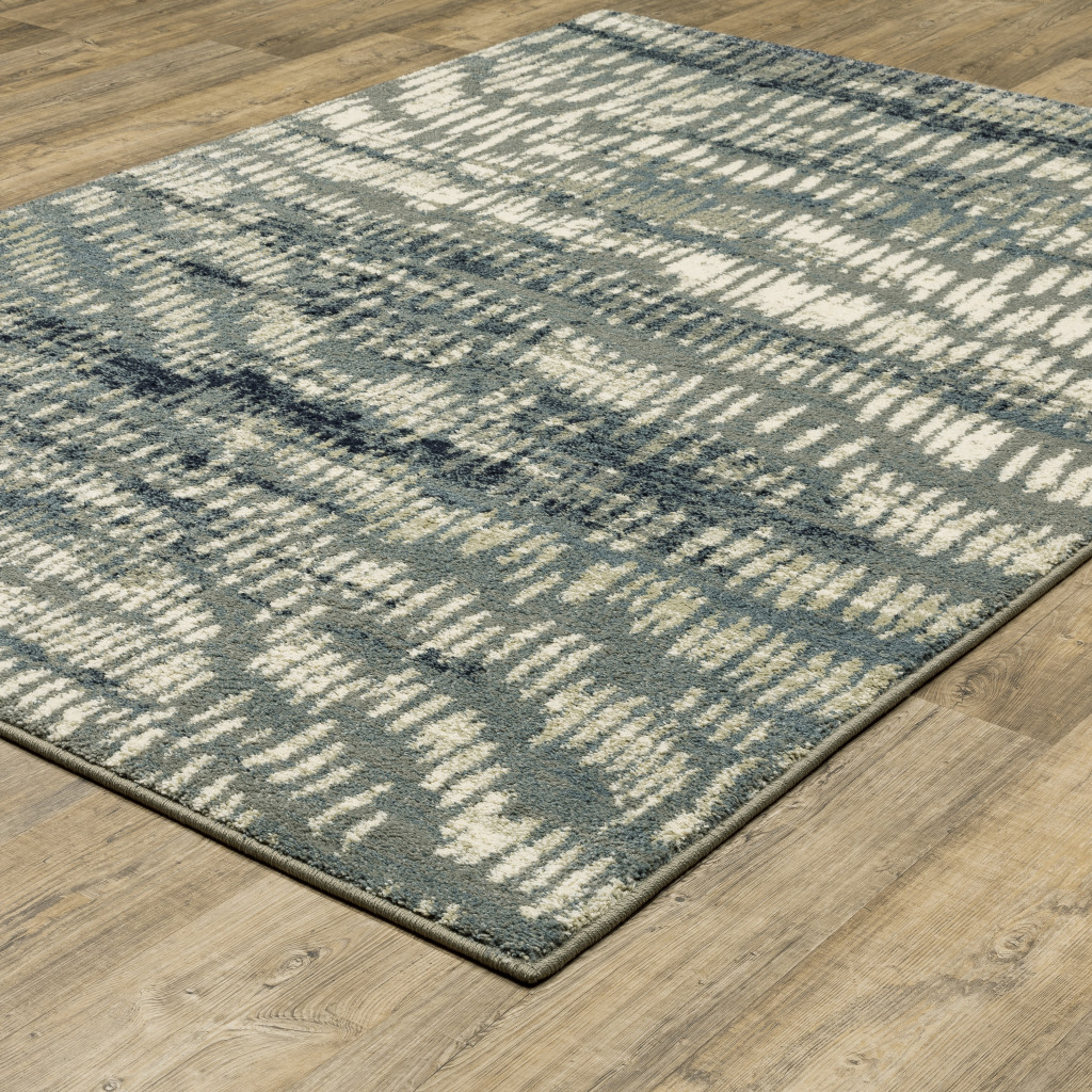 10" X 13" Grey Beige Blue And Light Blue Abstract Power Loom Stain Resistant Area Rug