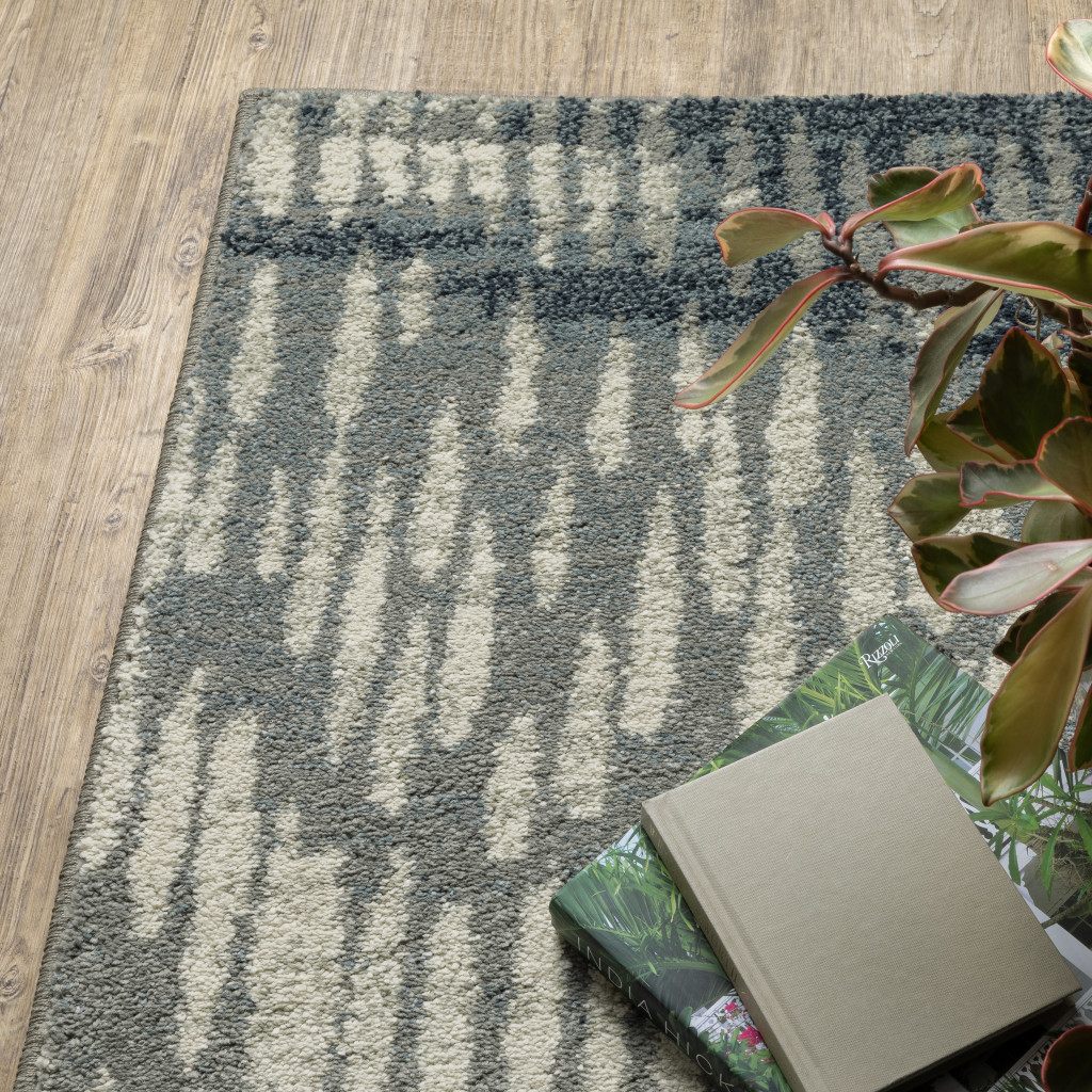 10" X 13" Grey Beige Blue And Light Blue Abstract Power Loom Stain Resistant Area Rug