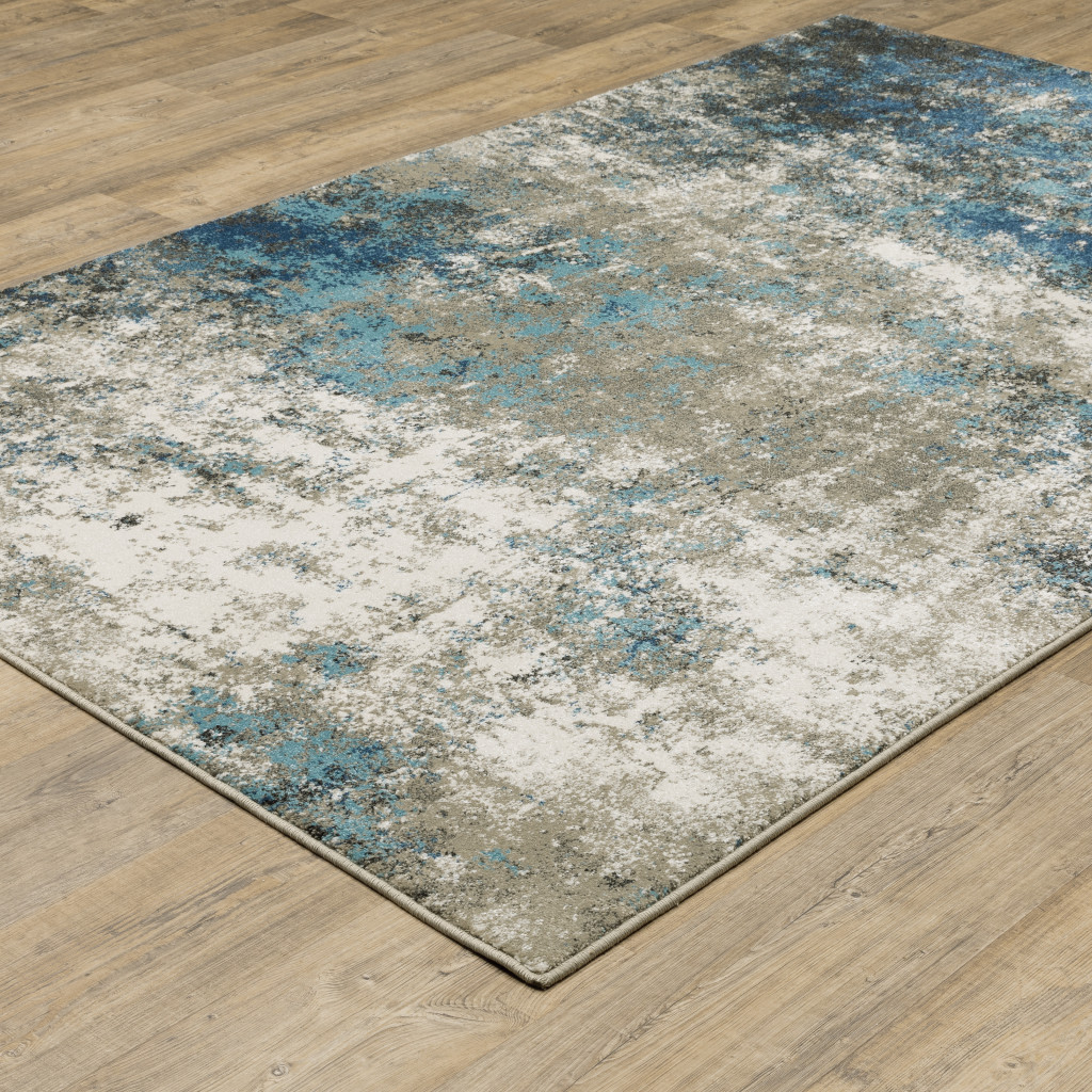 5" X 7" Blue Grey And Beige Abstract Power Loom Stain Resistant Area Rug