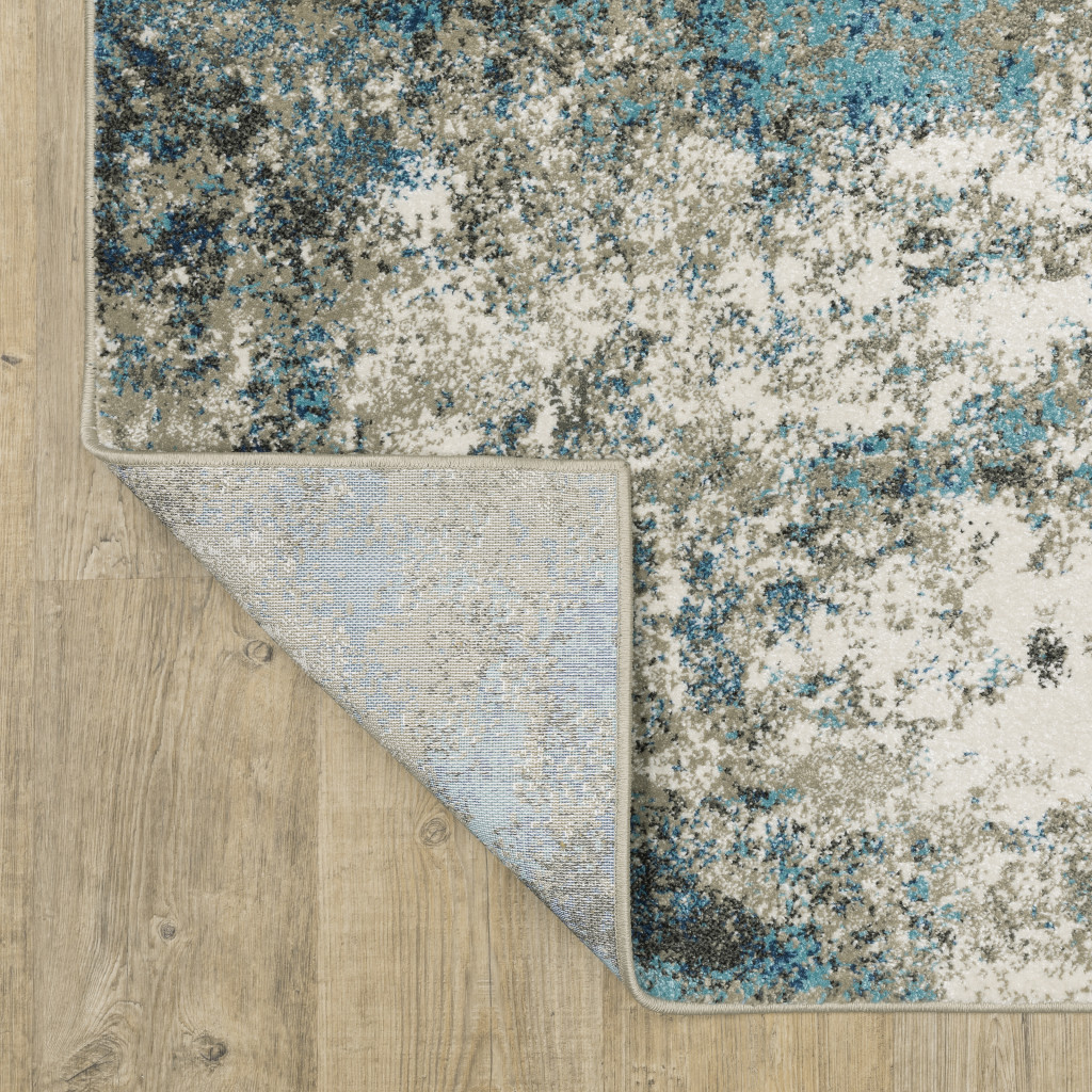 5" X 7" Blue Grey And Beige Abstract Power Loom Stain Resistant Area Rug