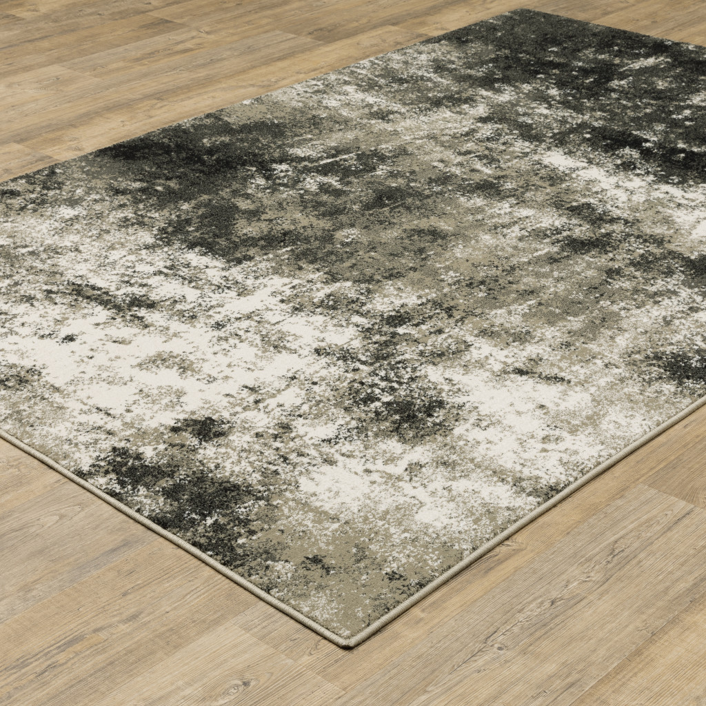 10" X 13" Gray and Ivory Abstract Power Loom Area Rug