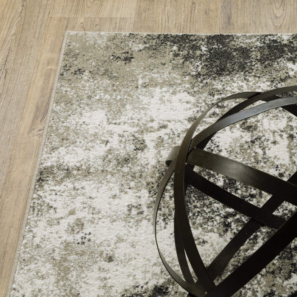 10" X 13" Gray and Ivory Abstract Power Loom Area Rug