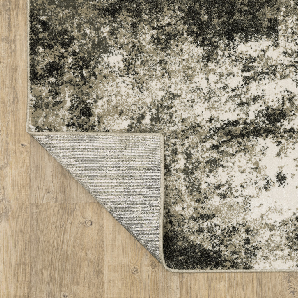 10" X 13" Gray and Ivory Abstract Power Loom Area Rug