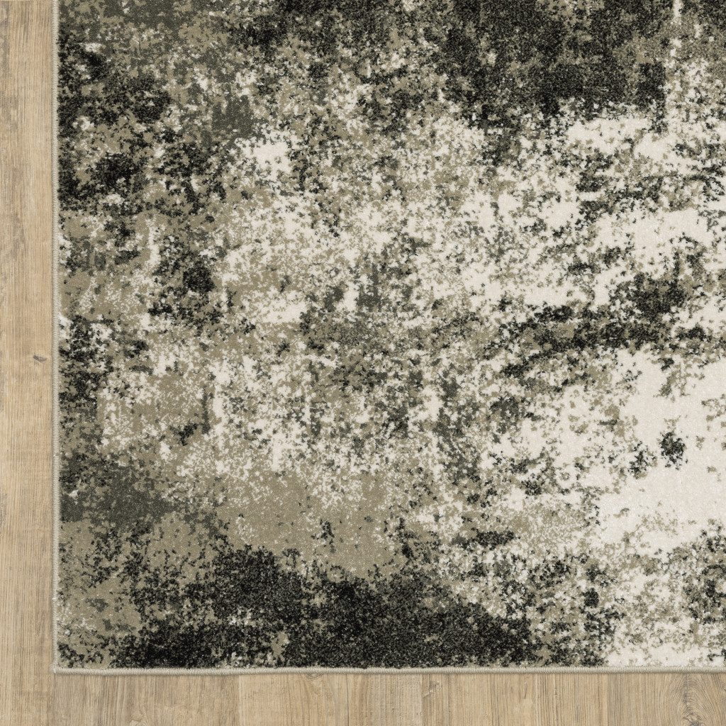 10" X 13" Gray and Ivory Abstract Power Loom Area Rug