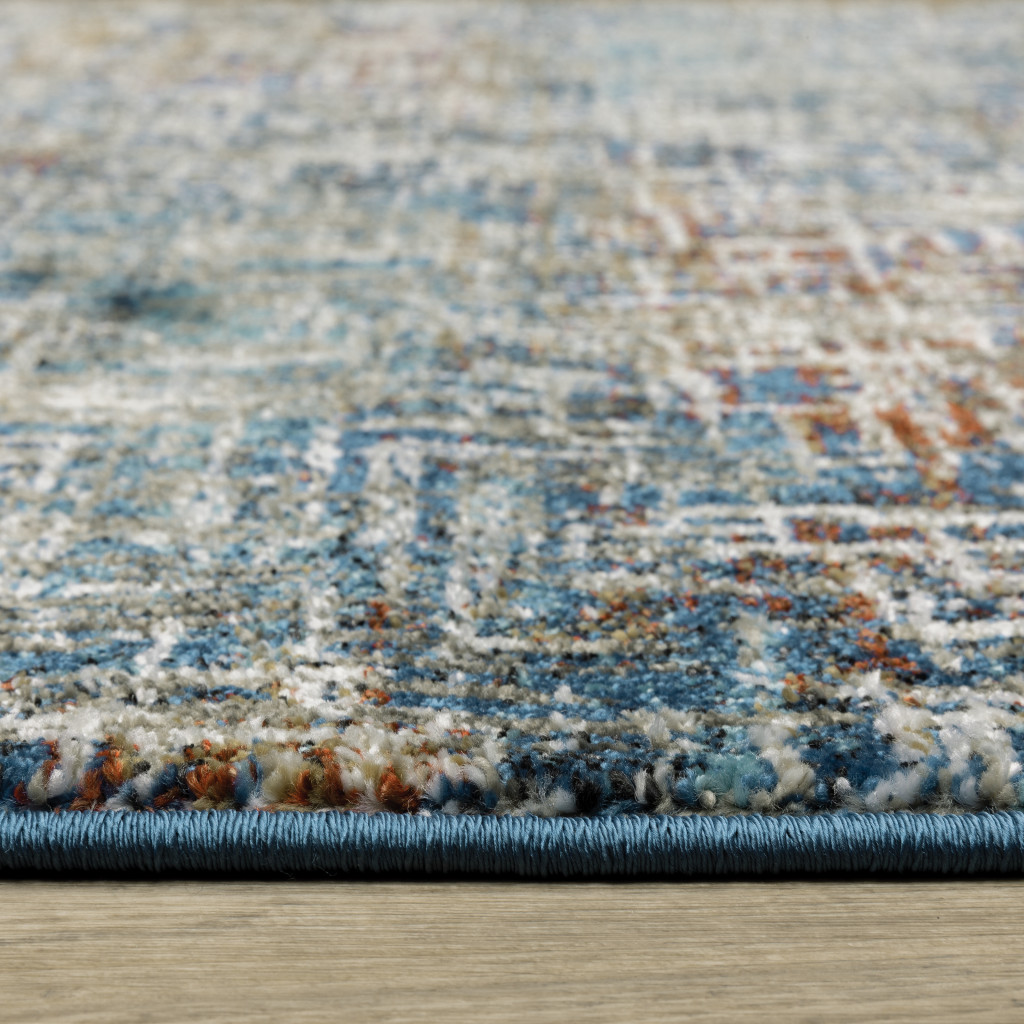 6" X 9" Blue Teal Gold Rust And Beige Abstract Power Loom Stain Resistant Area Rug