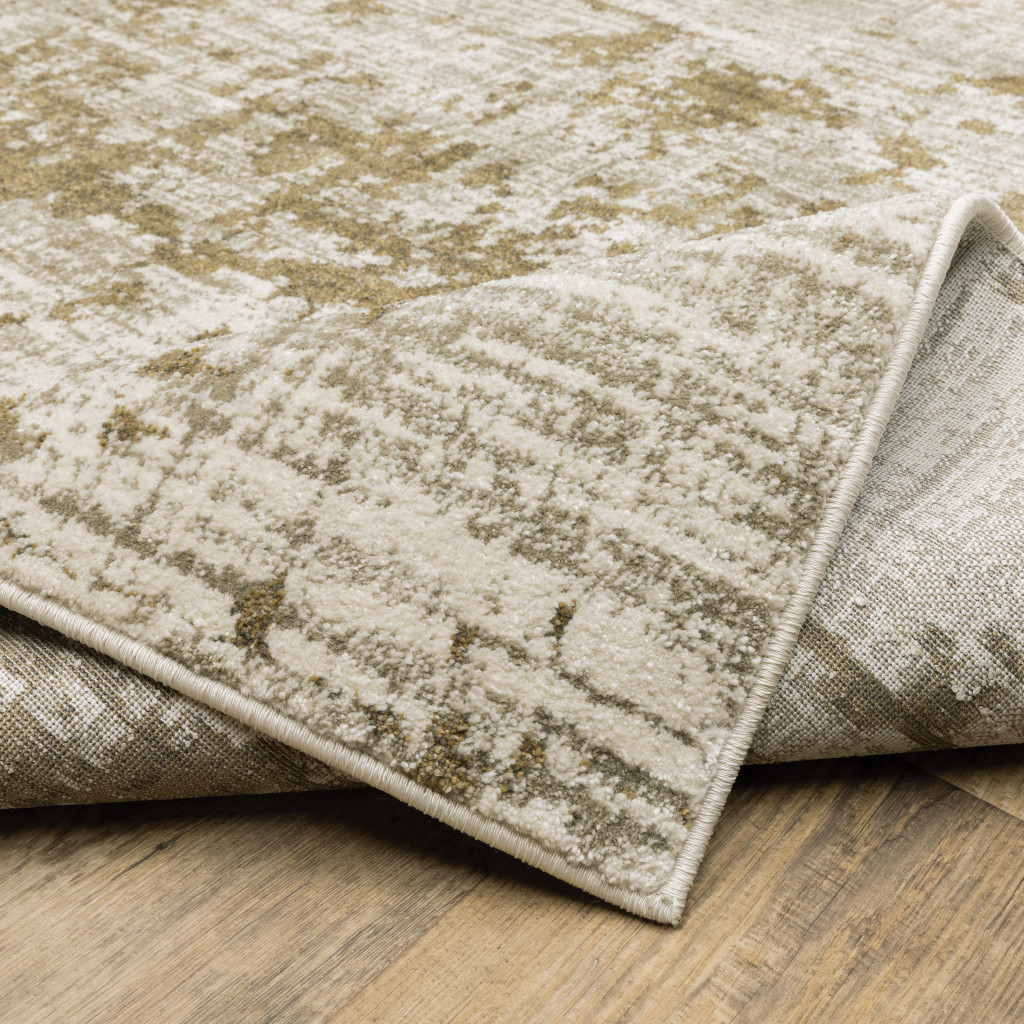 6" X 9" Beige Gold And Grey Abstract Power Loom Stain Resistant Area Rug