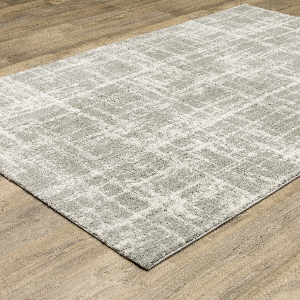 4" X 6" Grey And Ivory Abstract Shag Power Loom Stain Resistant Area Rug