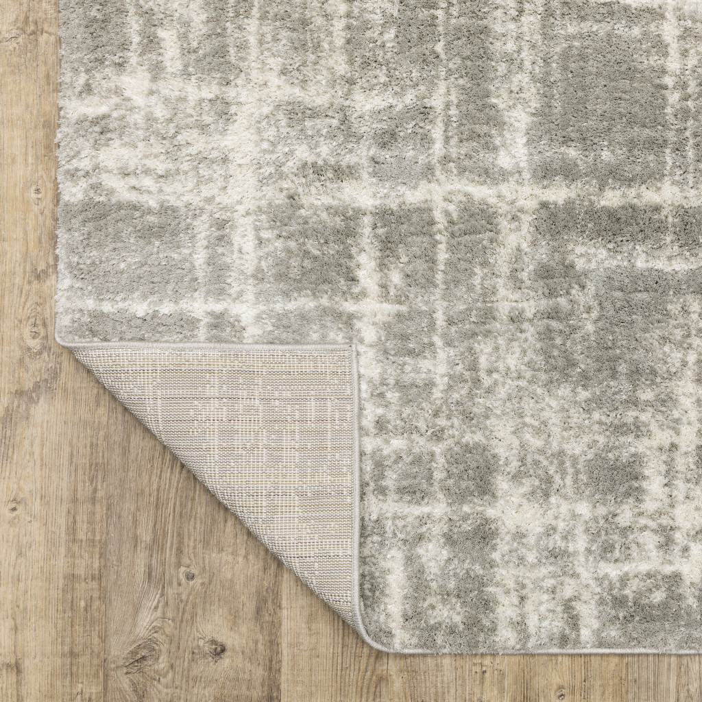 4" X 6" Grey And Ivory Abstract Shag Power Loom Stain Resistant Area Rug