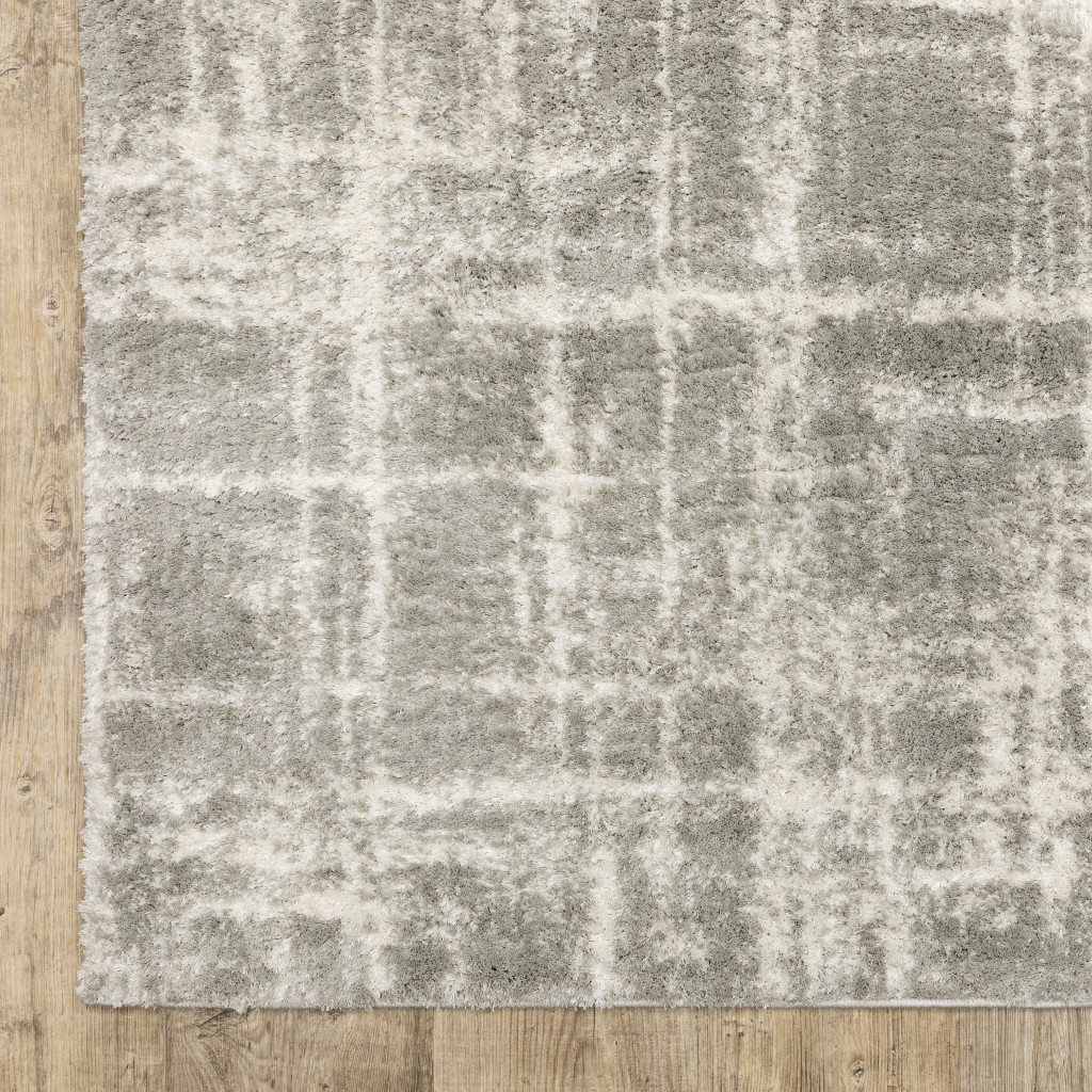 4" X 6" Grey And Ivory Abstract Shag Power Loom Stain Resistant Area Rug