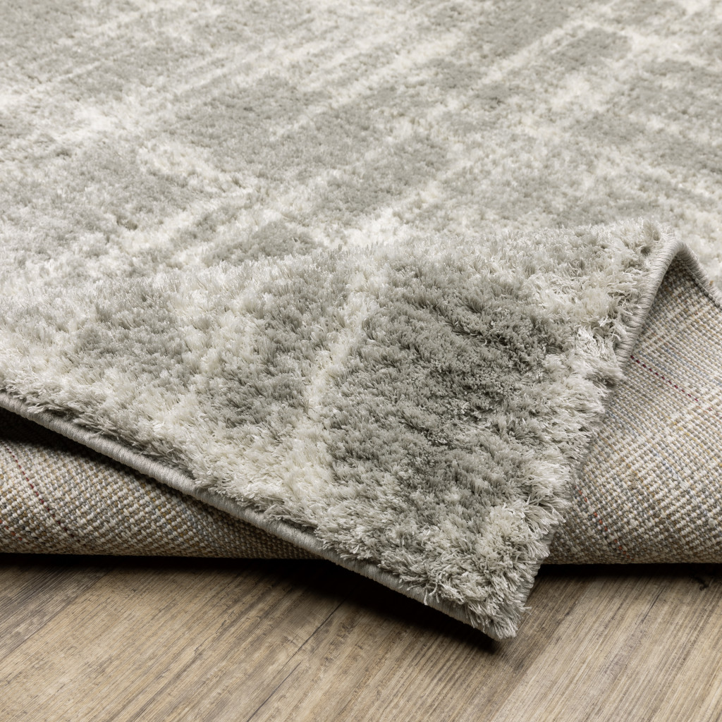 4" X 6" Grey And Ivory Abstract Shag Power Loom Stain Resistant Area Rug