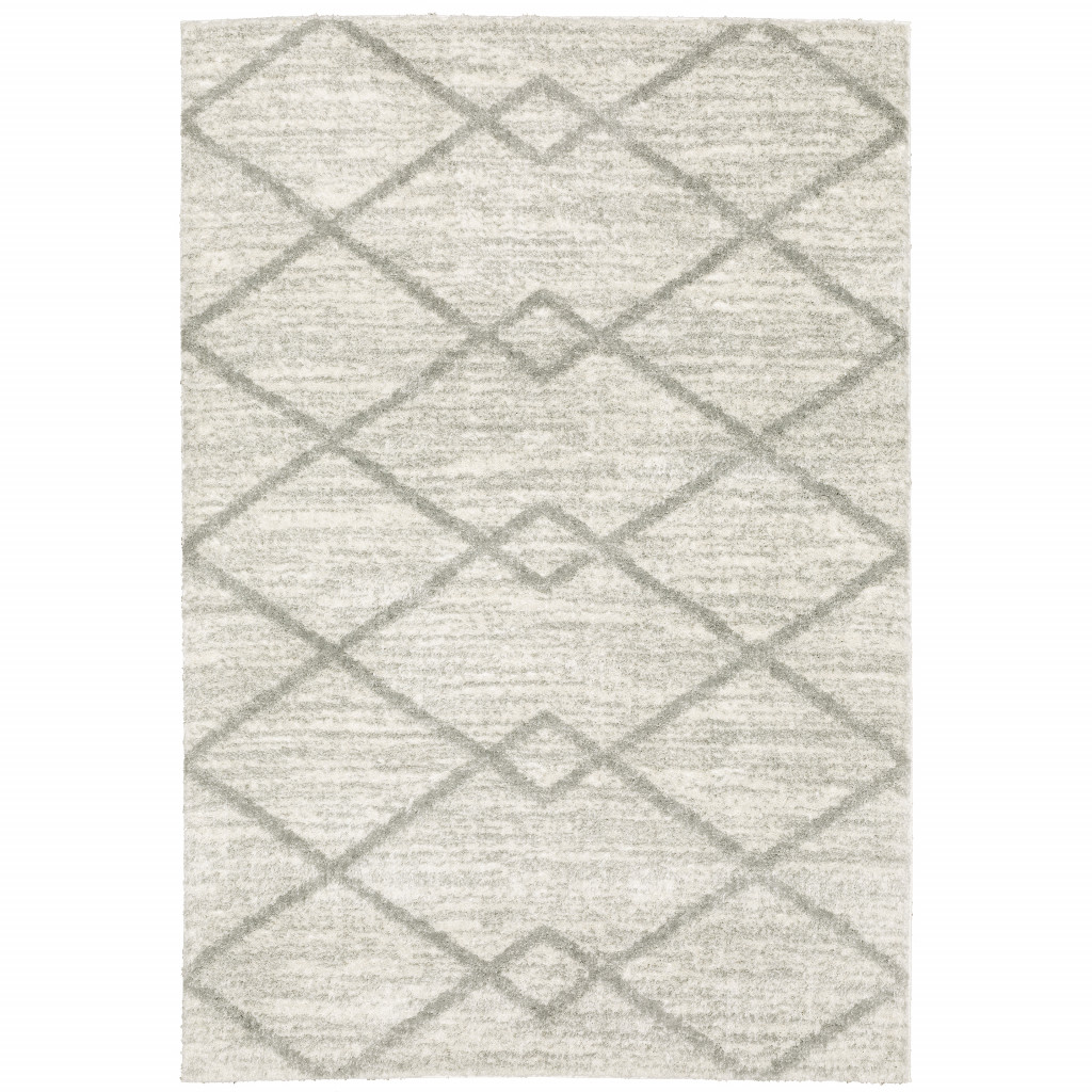 2" X 3" Ivory And Grey Geometric Shag Power Loom Stain Resistant Area Rug