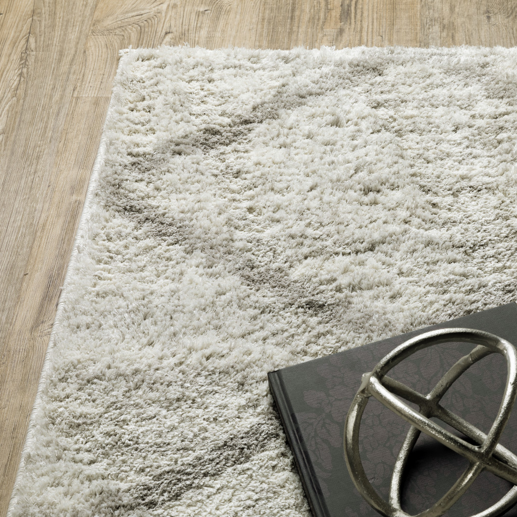 2" X 3" Ivory And Grey Geometric Shag Power Loom Stain Resistant Area Rug