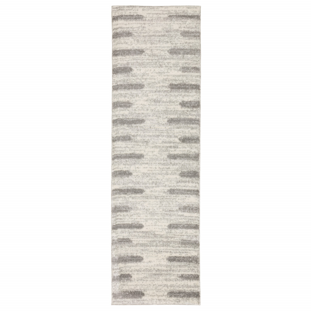 2" X 8" Ivory And Grey Geometric Shag Power Loom Stain Resistant Runner Rug