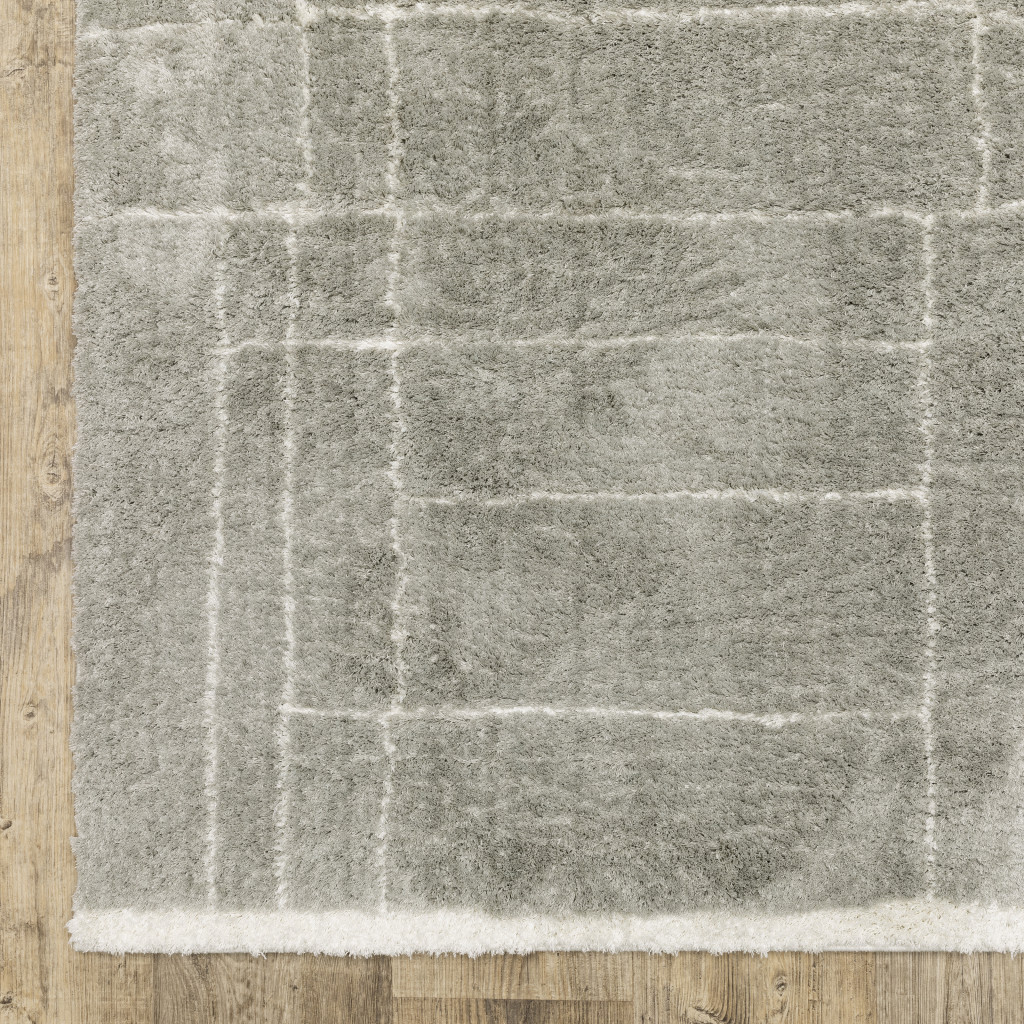 4" X 6" Grey And Ivory Geometric Shag Power Loom Stain Resistant Area Rug