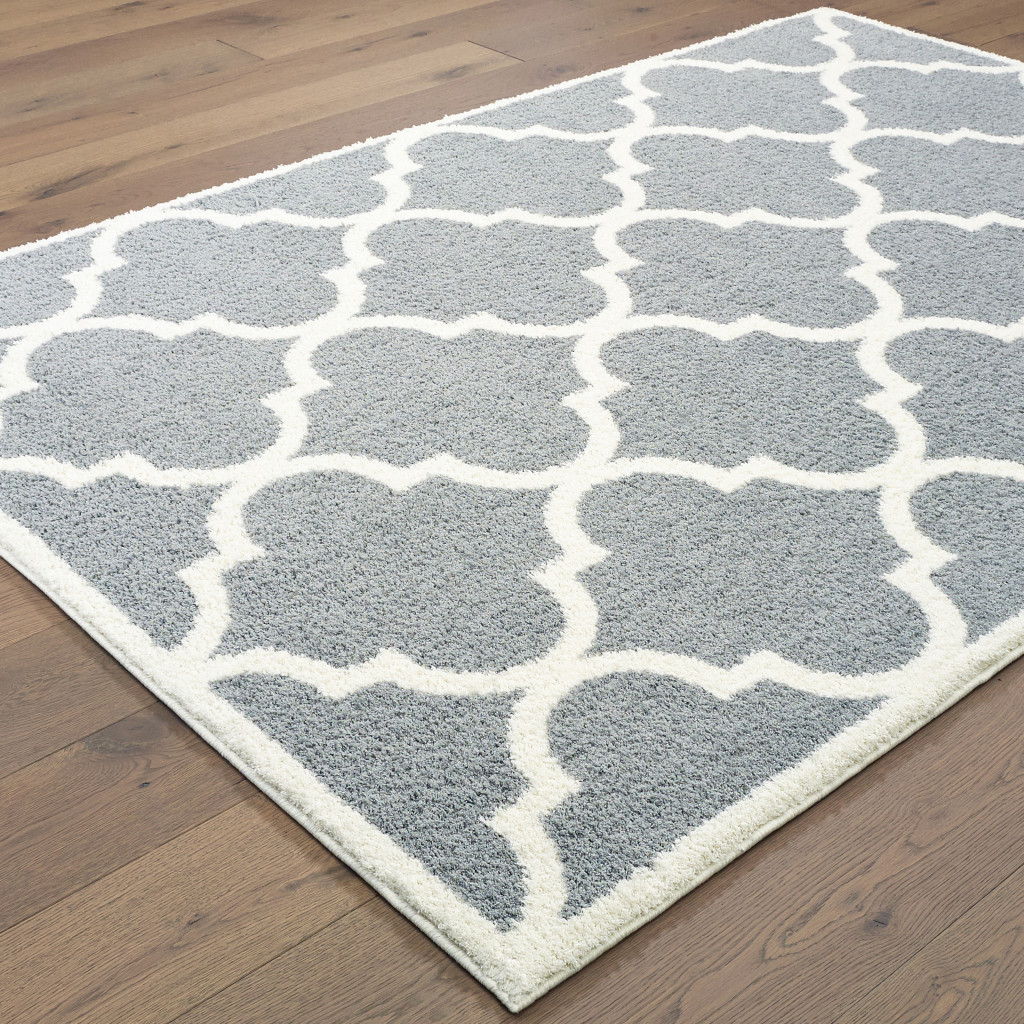 2" X 3" Grey And Ivory Geometric Shag Power Loom Stain Resistant Area Rug