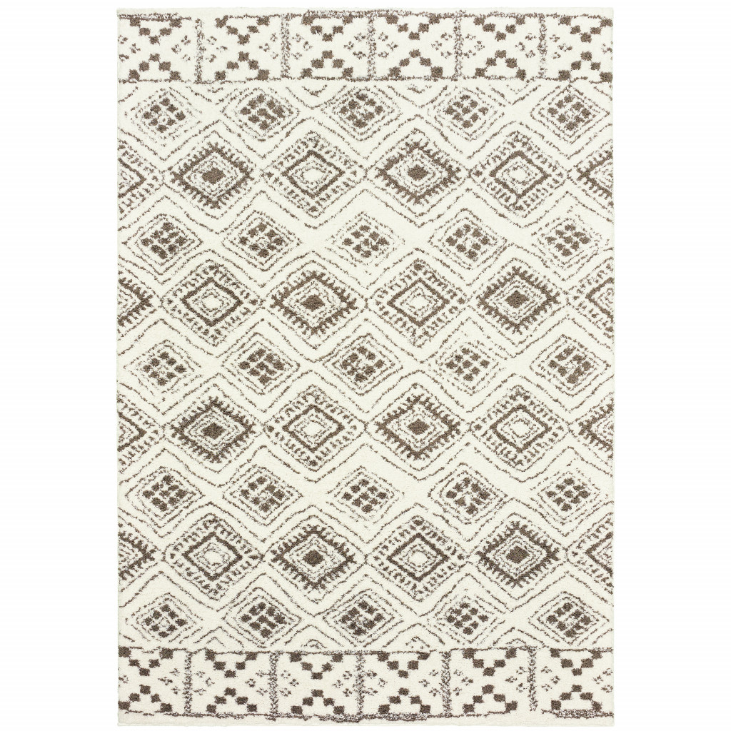 4" X 6" Ivory And Brown Geometric Shag Power Loom Stain Resistant Area Rug