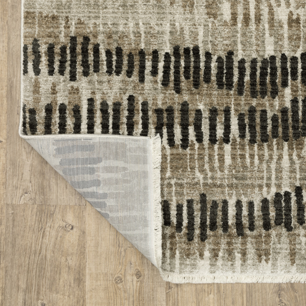 2" X 8" Beige Ivory Charcoal Brown Tan And Grey Abstract Power Loom Stain Resistant Runner Rug With Fringe