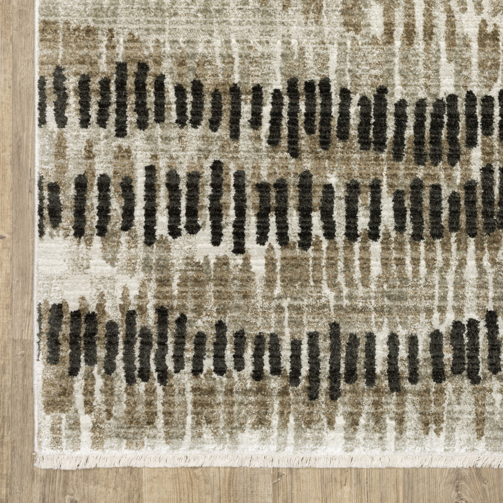 5" X 8" Beige Ivory Charcoal Brown Tan And Grey Abstract Power Loom Stain Resistant Area Rug With Fringe