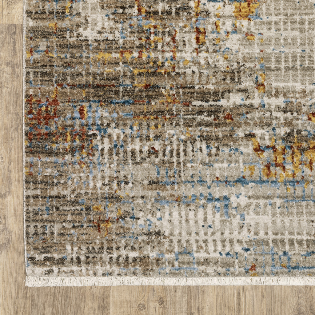 5" X 8" Beige Grey Brown Gold Red And Blue Abstract Power Loom Stain Resistant Area Rug With Fringe