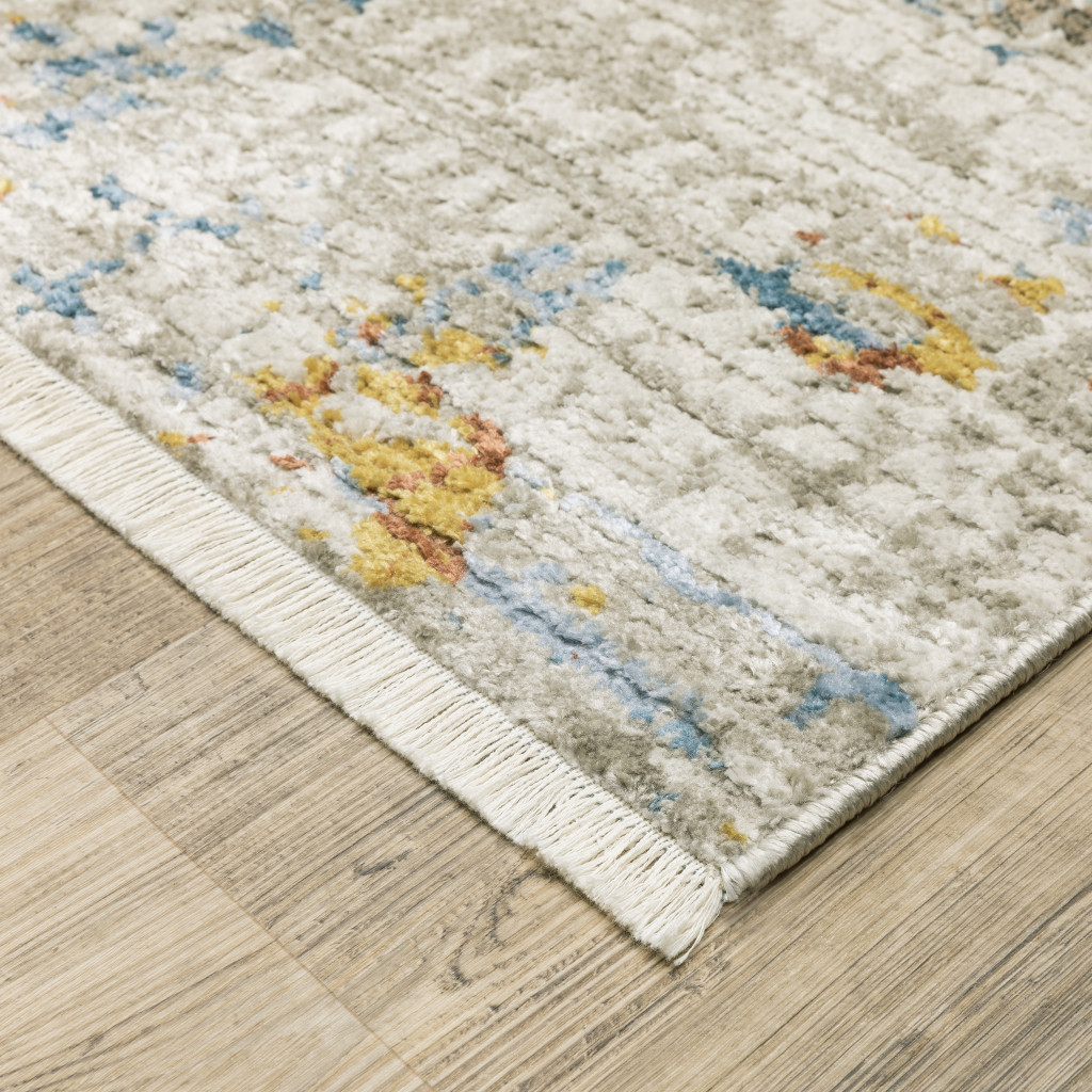 10" X 13" Beige Grey Brown Gold Red And Blue Abstract Power Loom Stain Resistant Area Rug With Fringe