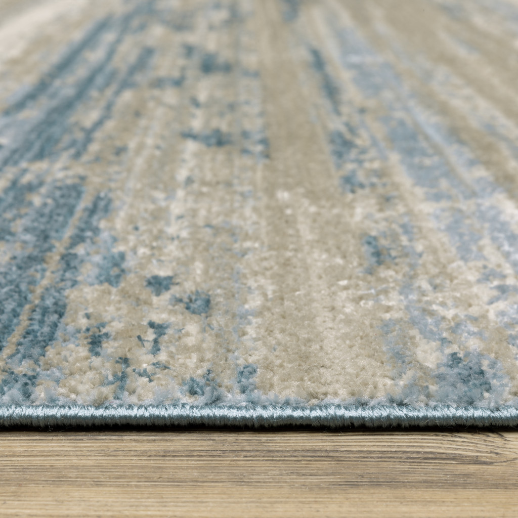 2" X 8" Blue And Ivory Abstract Power Loom Runner Rug With Fringe