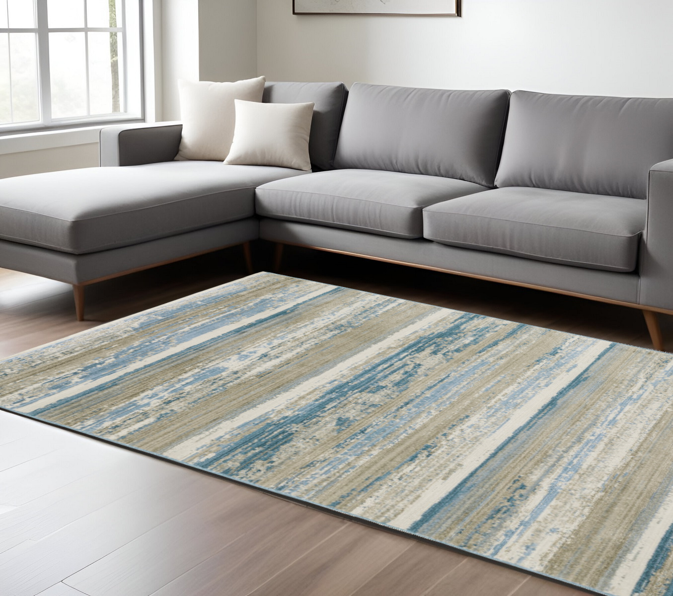 8" X 11" Ivory Beige Grey Blue And Tan Abstract Power Loom Stain Resistant Area Rug With Fringe