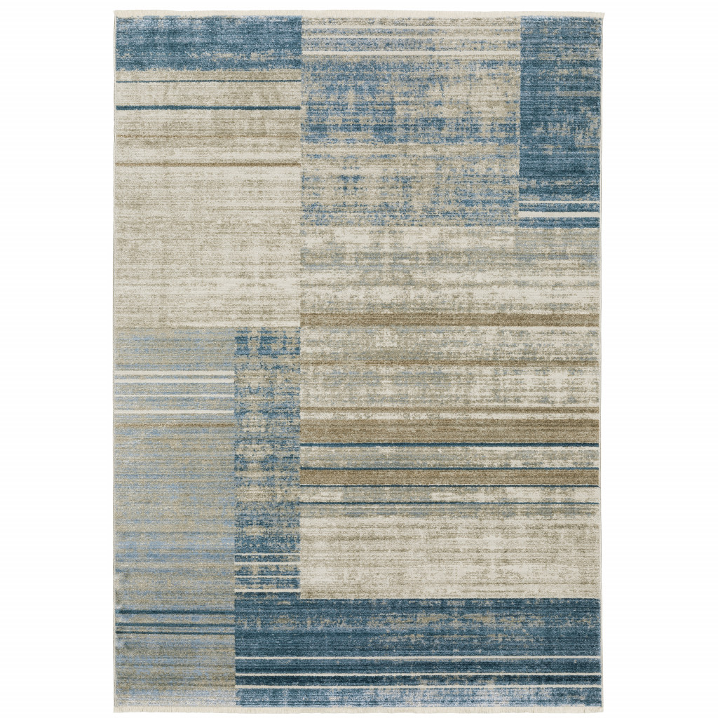 5" X 8" Blue Dark Blue Teal Grey Ivory Beige And Tan Geometric Power Loom Stain Resistant Area Rug With Fringe