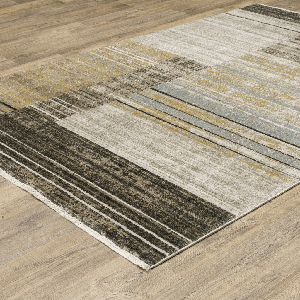 6" X 9" Beige Charcoal Brown Grey Tan Gold And Blue Geometric Power Loom Stain Resistant Area Rug With Fringe