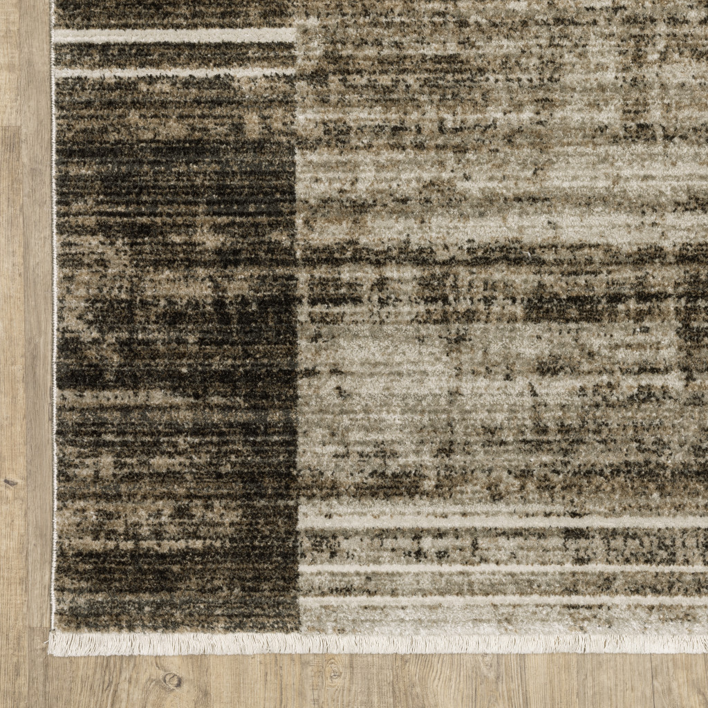 6" X 9" Beige Charcoal Brown Grey Tan Gold And Blue Geometric Power Loom Stain Resistant Area Rug With Fringe