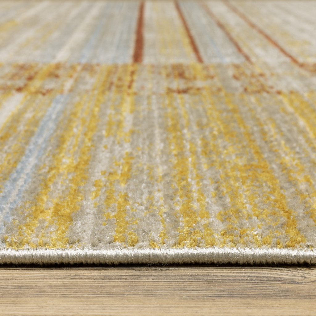 4" X 6" Rust Gold Blue Grey Ivory And Tan Geometric Power Loom Stain Resistant Area Rug With Fringe