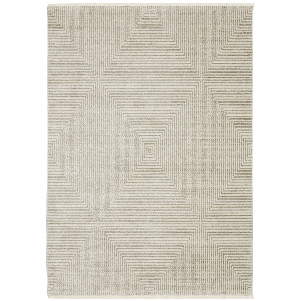 5" X 8" Ivory Beige Taupe And Tan Geometric Power Loom Stain Resistant Area Rug With Fringe