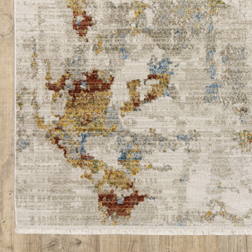 4" X 6" Beige Grey Gold Blue Rust And Teal Abstract Power Loom Stain Resistant Area Rug With Fringe