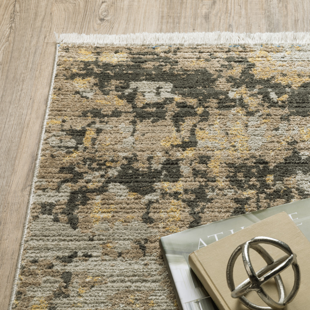 5" X 8" Grey Gold Black Charcoal And Beige Abstract Power Loom Stain Resistant Area Rug With Fringe