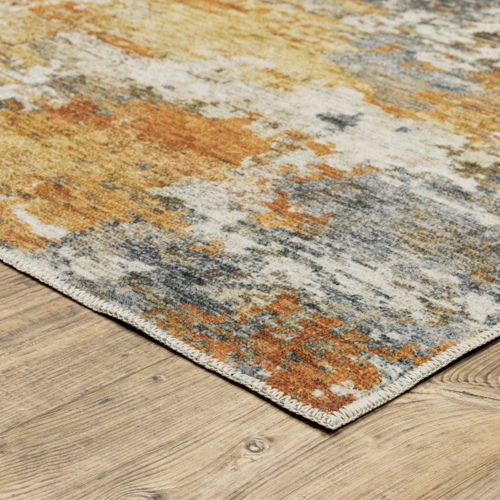 2" X 8" Teal Blue Orange Gold Grey Tan Brown And Beige Abstract Printed Stain Resistant Non Skid Runner Rug