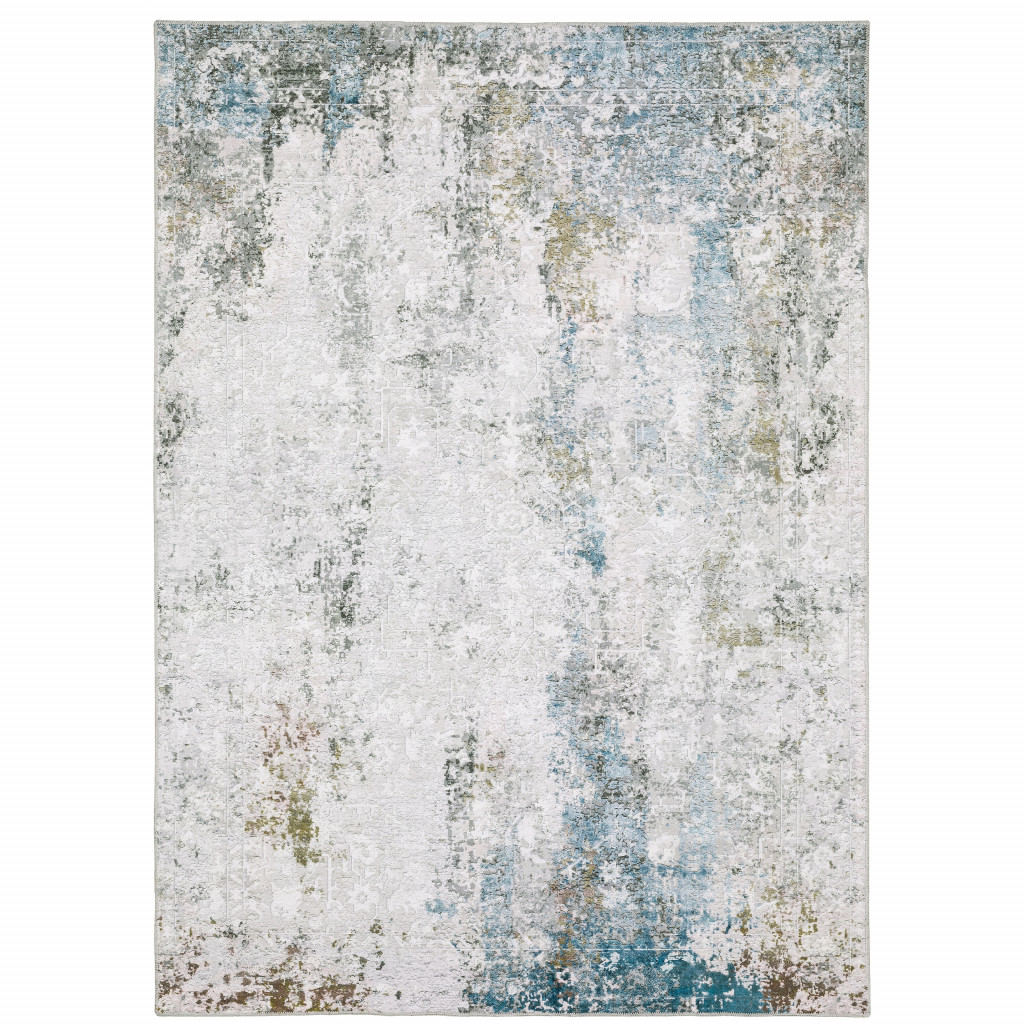 2" X 3" Ivory And Blue Abstract Printed Stain Resistant Non Skid Area Rug