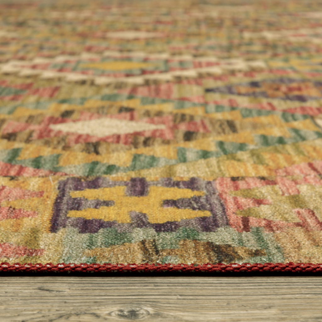 2" X 3" Gold Orange Brown Red Green Purple And Beige Southwestern Printed Stain Resistant Non Skid Area Rug
