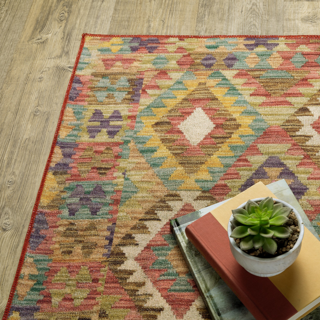 2" X 3" Gold Orange Brown Red Green Purple And Beige Southwestern Printed Stain Resistant Non Skid Area Rug