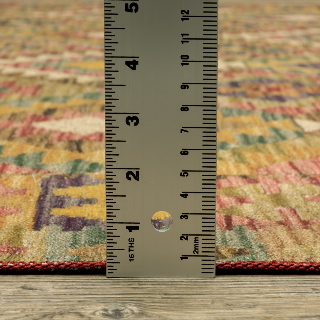 2" X 3" Gold Orange Brown Red Green Purple And Beige Southwestern Printed Stain Resistant Non Skid Area Rug