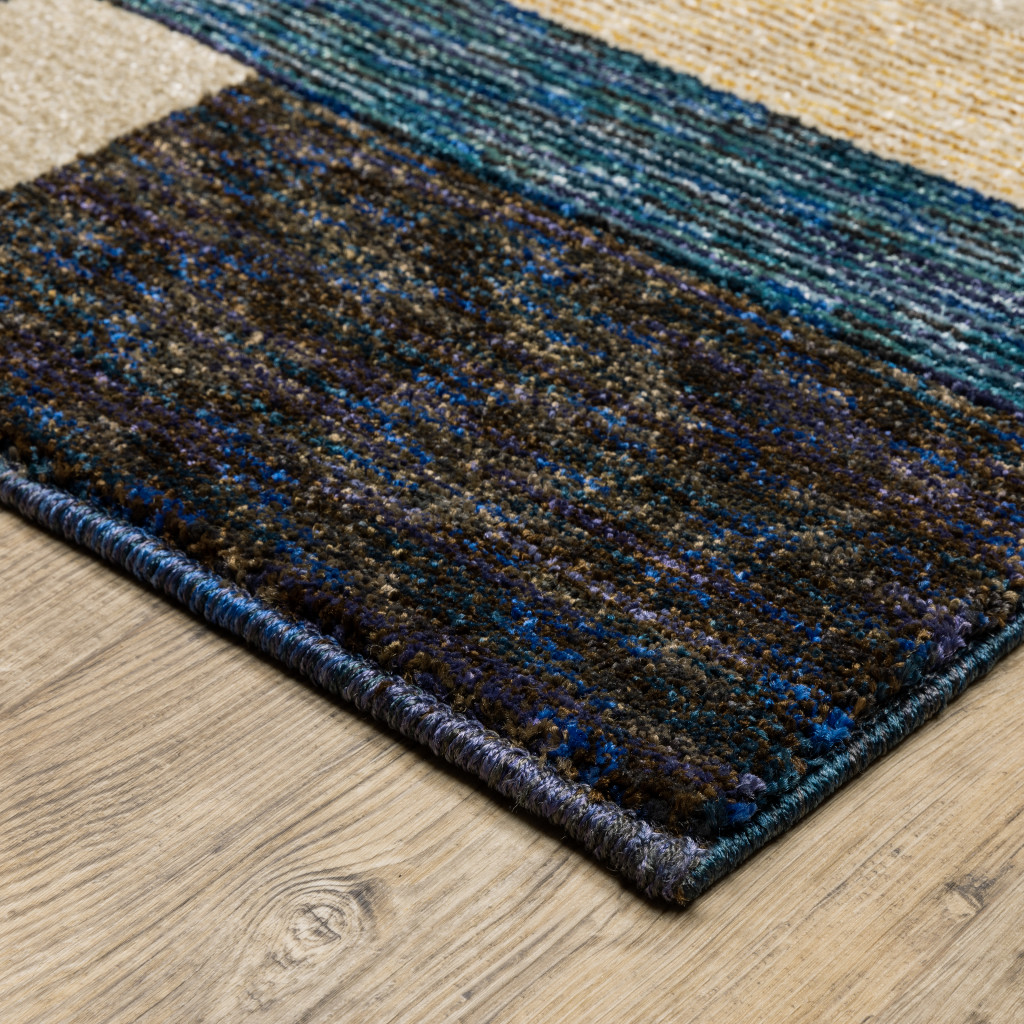 7" X 10" Blue and Beige Geometric Power Loom Area Rug