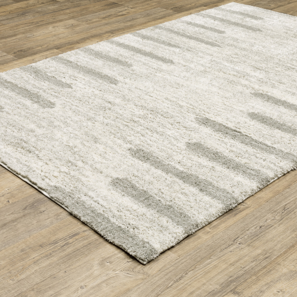 8" X 11" Gray and Ivory Geometric Shag Power Loom Area Rug