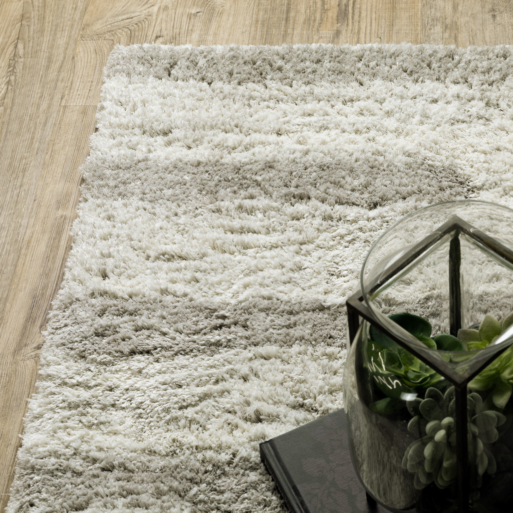 8" X 11" Gray and Ivory Geometric Shag Power Loom Area Rug