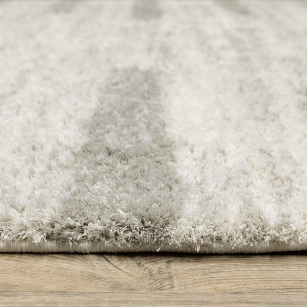 8" X 11" Gray and Ivory Geometric Shag Power Loom Area Rug
