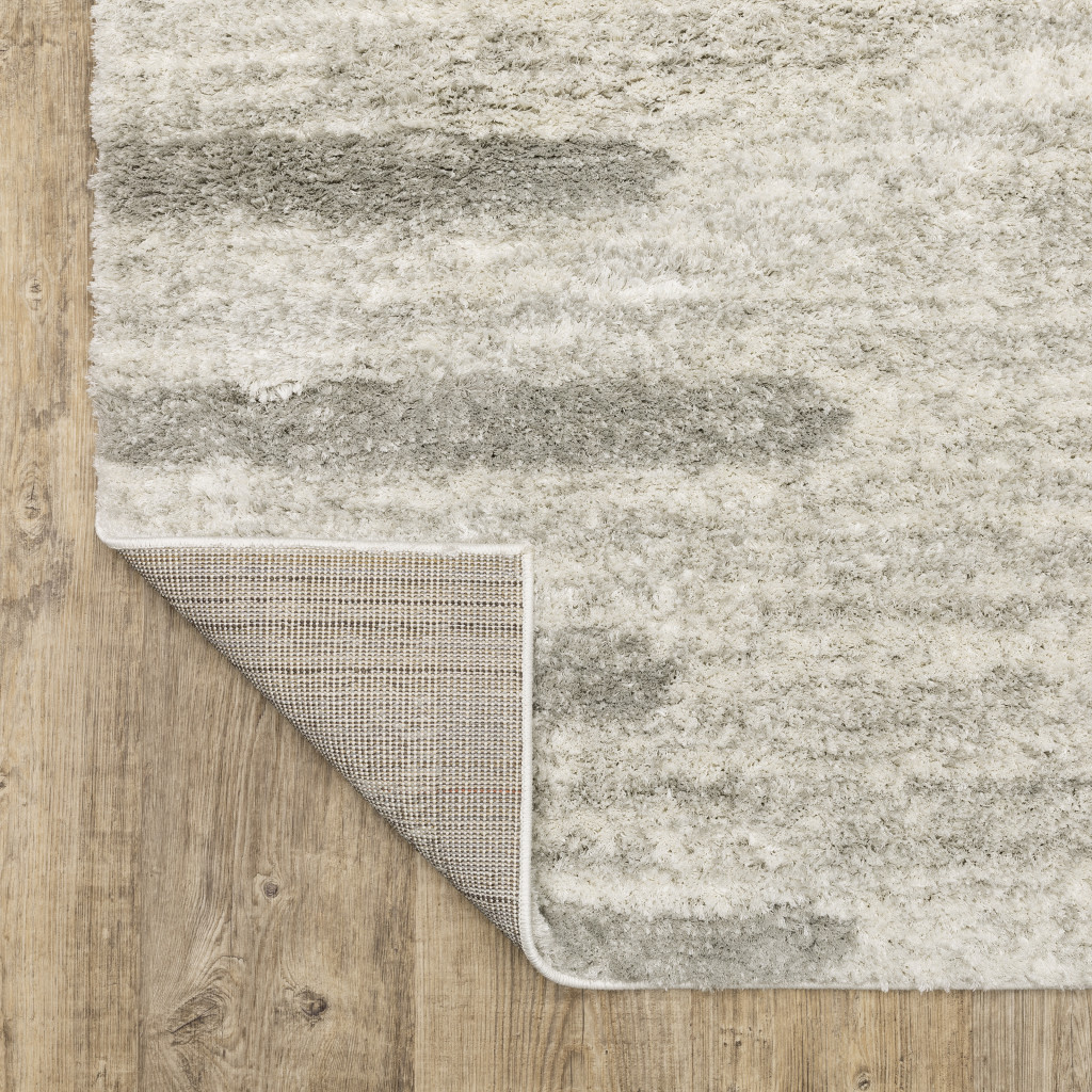 8" X 11" Gray and Ivory Geometric Shag Power Loom Area Rug